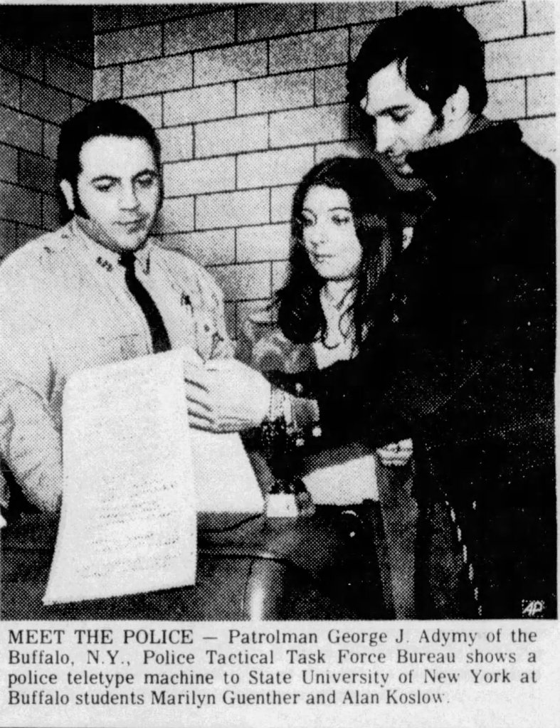 Alan Koslow participating in a police ride-along briefing as part of the Pilot 100 program with Buffalo police, early 1970s