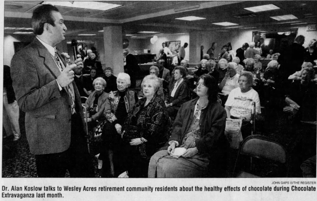 Dr. Alan Koslow delivering a community health lecture to residents at Wesley Acres retirement community in Des Moines

Why this works

Positions you as a physician-educator, not a novelty speaker

Emphasizes evidence-based public health, not gimmicks

Works equally well on:

Bio page

Media / Press page

Later LinkedIn image posts

Target Use

Website: Yes (Bio + Media page)

LinkedIn: Yes (later, single-image short post)

Medium: Optional embed later

This is now one of your 6 core images.

Say “Lock Wesley Acres” and we move to final Pilot 100 image selection (choosing which of the 4 becomes canonical).

ChatGPT is AI and can make mistakes. Check important info